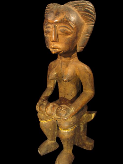Sitzende Mutter/Kind-Figur